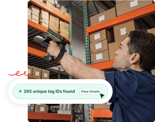 A worker scans warehouse shelves with a handheld device; notification shows 265 unique tag IDs found.