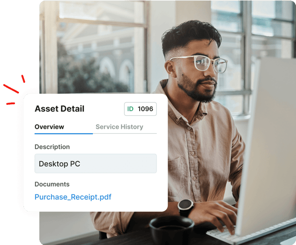 A man uses a desktop computer; an asset detail window for a desktop PC is overlaid on the image.