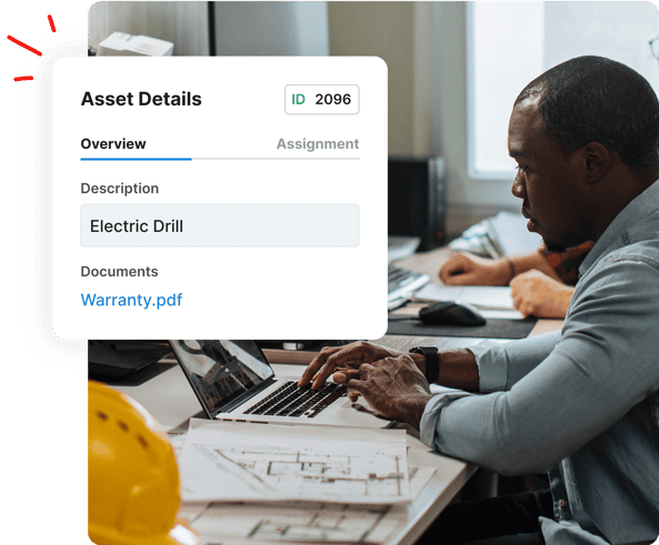 A man works at a laptop; an asset details popup shows info for an electric drill and a warranty PDF.