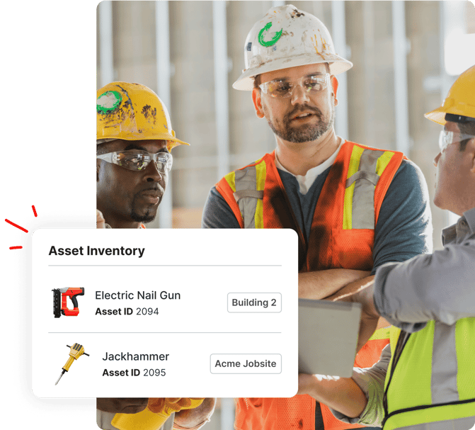 Three construction workers in safety gear discuss asset inventory displayed on a digital tablet screen.